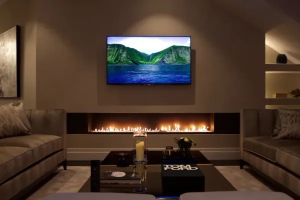 Over the fireplace TV mounting in Sandy Springs, GA