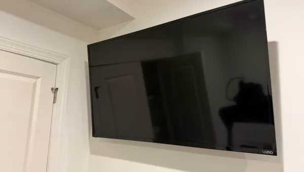 Condo & High-Rise TV Mounting in Miami: HOA Rules, COI, and Concrete