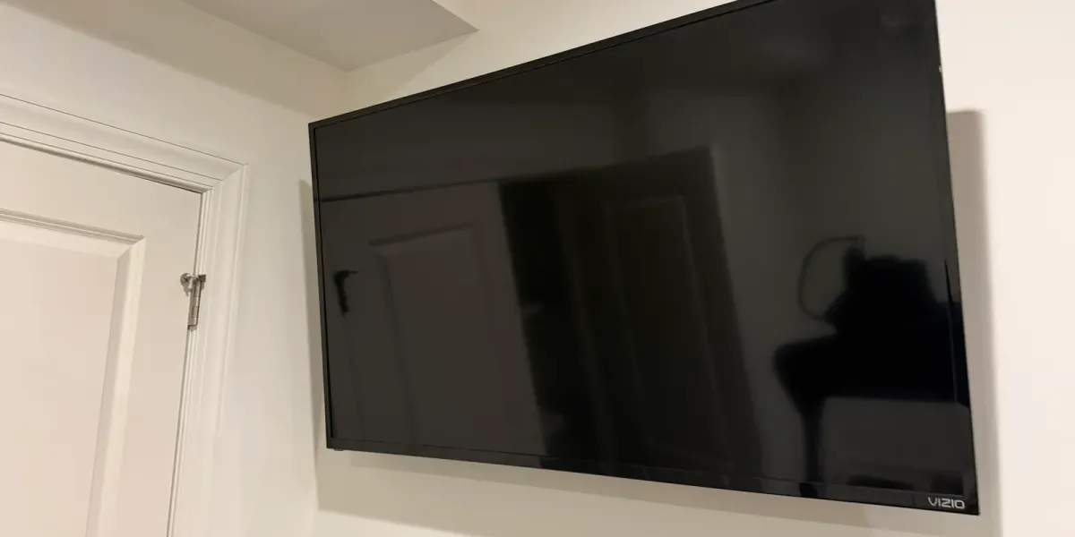 Condo & High-Rise TV Mounting in Miami: HOA Rules, COI, and Concrete