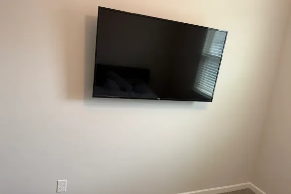 Full-motion mounts and hidden wiring in historic Covington homes