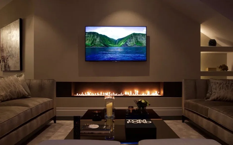 Over the fireplace TV mounting in Sandy Springs, GA